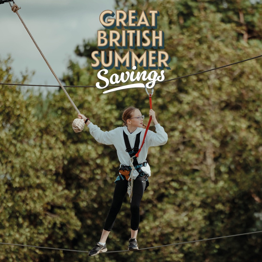 Families enjoying the Aztec Adventure Aqua Park - save this summer with Great British Summer Savings, 25 June to 1 September 2026.