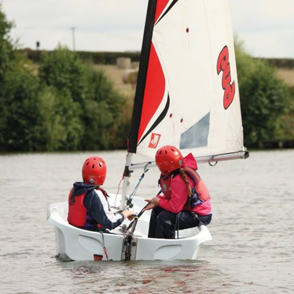 Sailing boat on the lake at Aztec Adventure Upton Warren