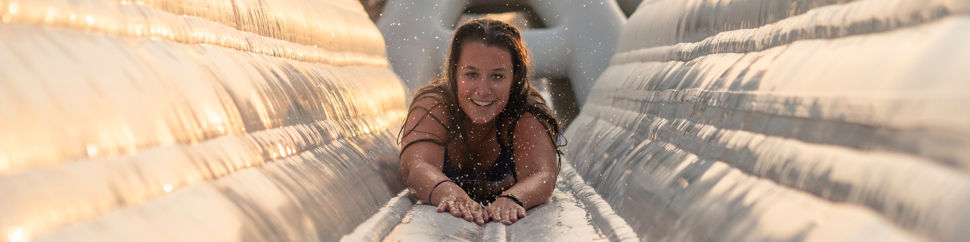 Aztec Adventure Aqua Park with woman sliding