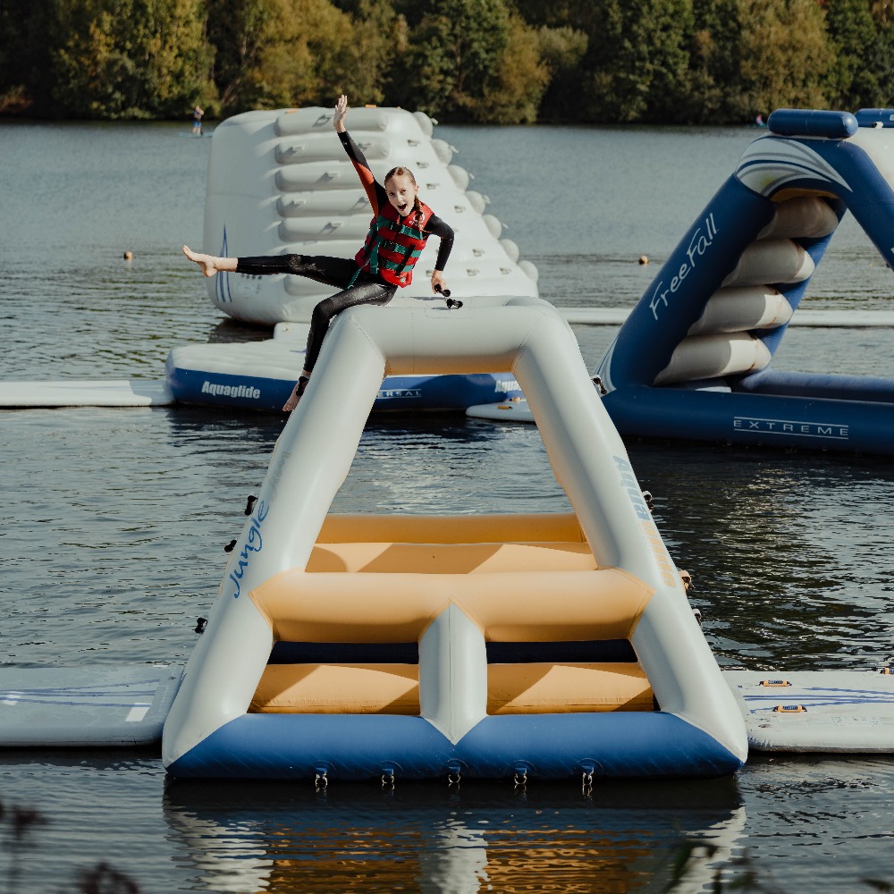Child on Aqua Park at Aztec Adventure Upton Warren