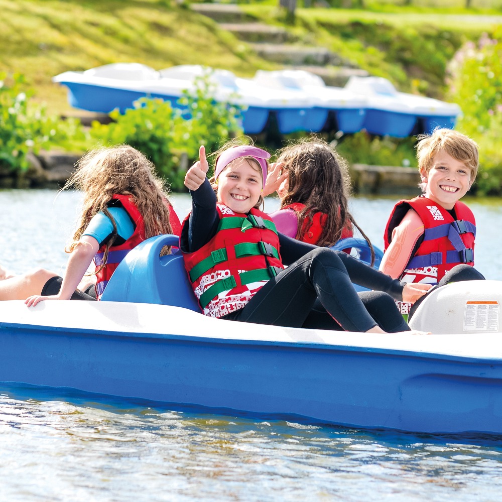 Children on a pedalo at Aztec Adventure Lower Moor
