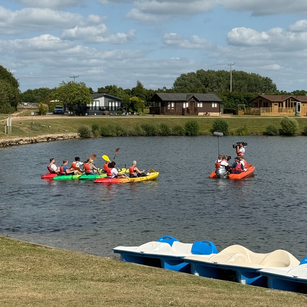 Group kayaking session filmed for Four in a Bed at Aztec Adventure's lake, Worcestershire