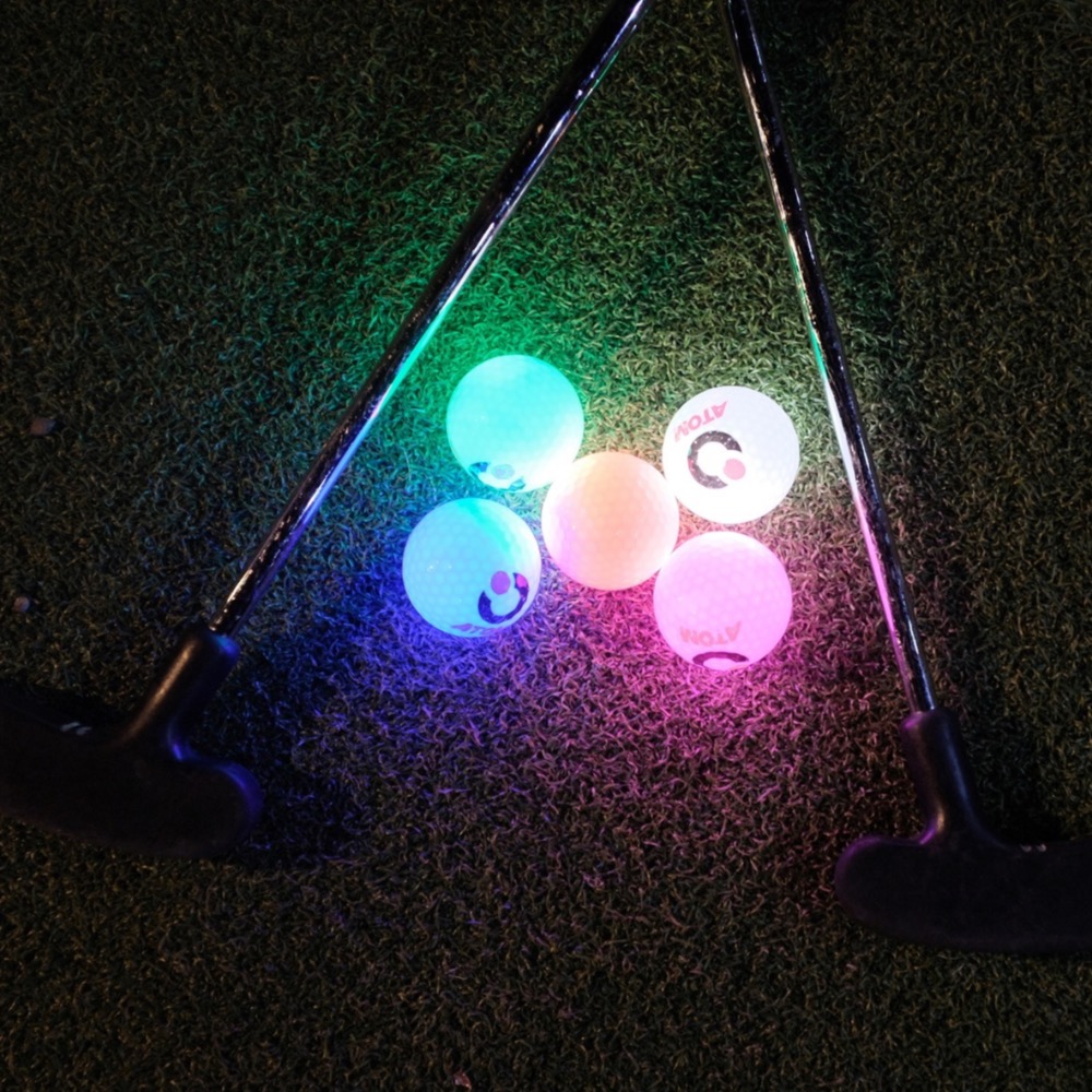 Glow-in-the-dark adventure golf course at Aztec Adventure Evesham decorated with Christmas lights and festive decorations