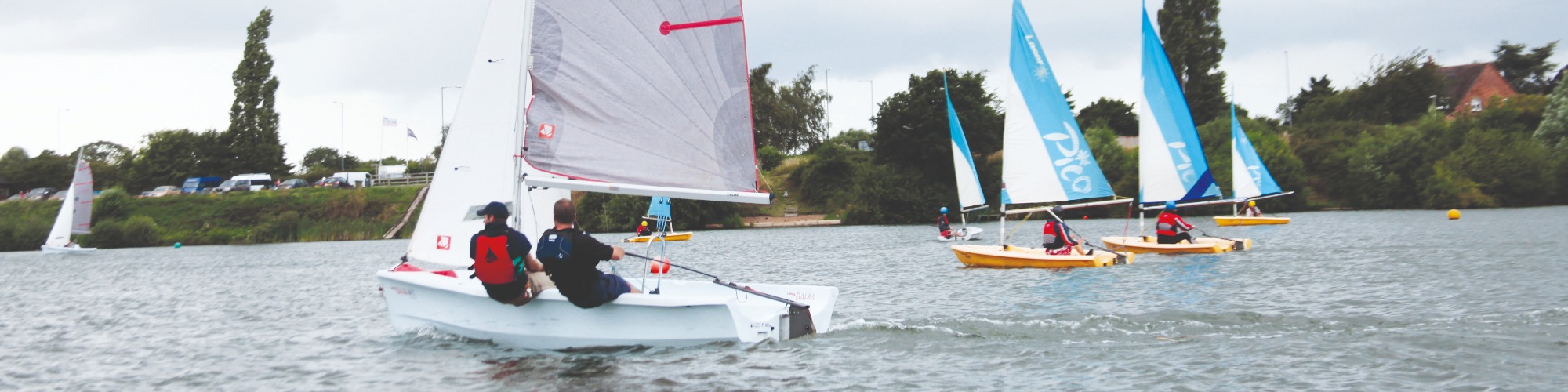 Sailing boats on the lake at Aztec Adventure Upton Warren