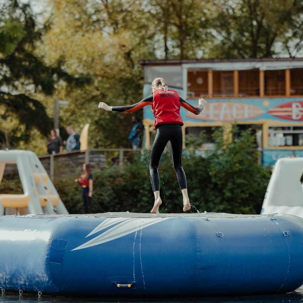 Child on Aqua Park at Aztec Adventure Upton Warren