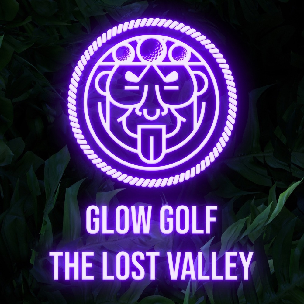 Glow-in-the-dark adventure golf course at Aztec Adventure Evesham decorated with Christmas lights and festive decorations