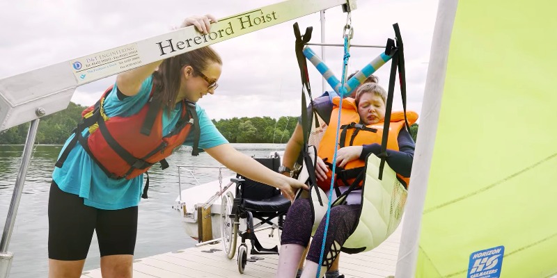 Participants from The Myriad Centre enjoying an inclusive sailing session with Aztec Adventure on a sunny day