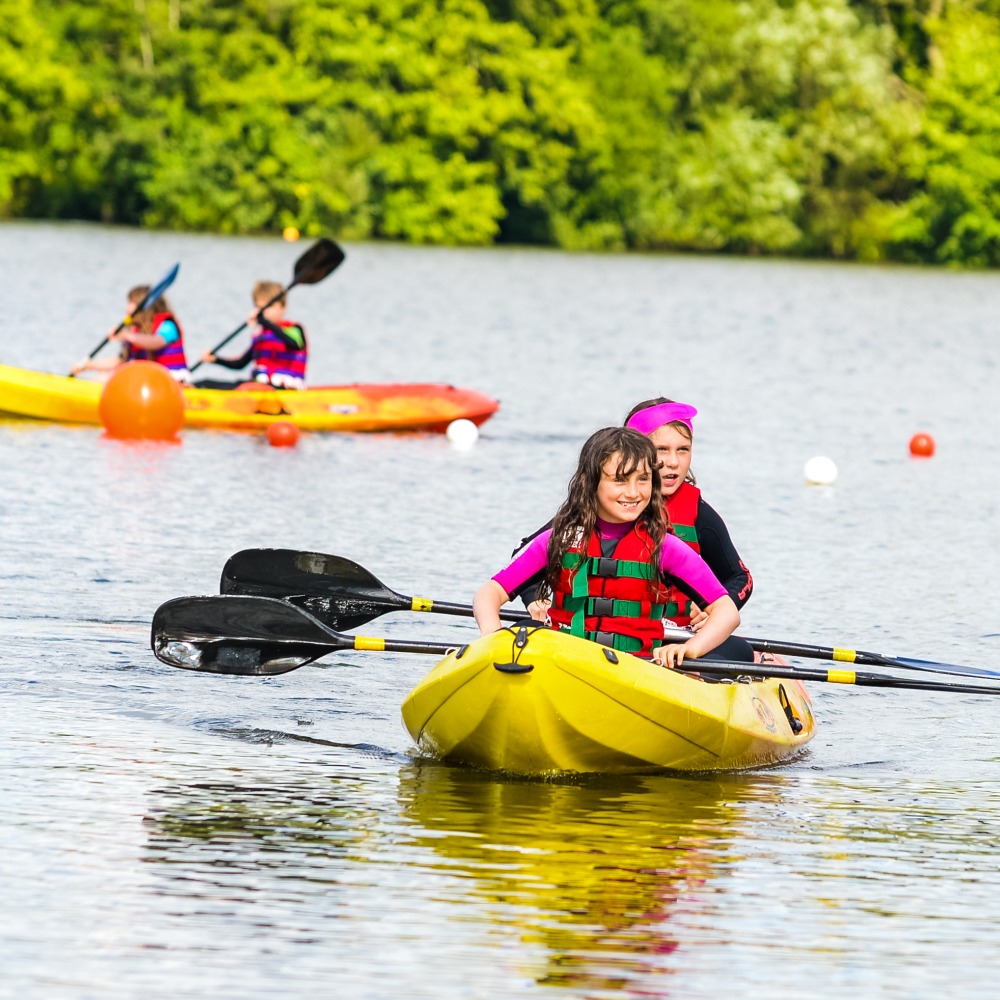 Children in a Double Kayak at Aztec Adventure Upton Warren