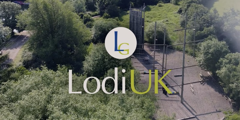 Lodi UK logo in front of a wooded area