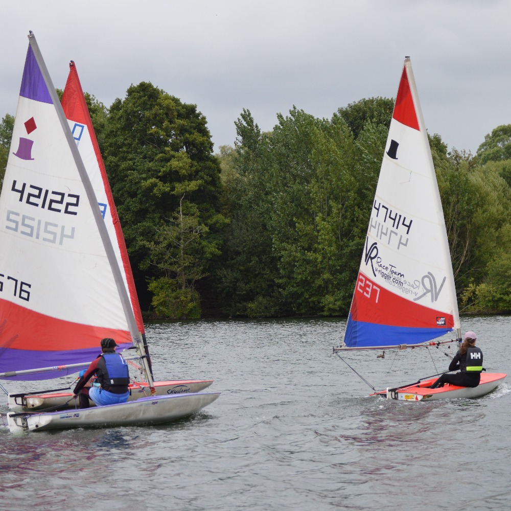 Sailing boats on the lake at Aztec Adventure Upton Warren
