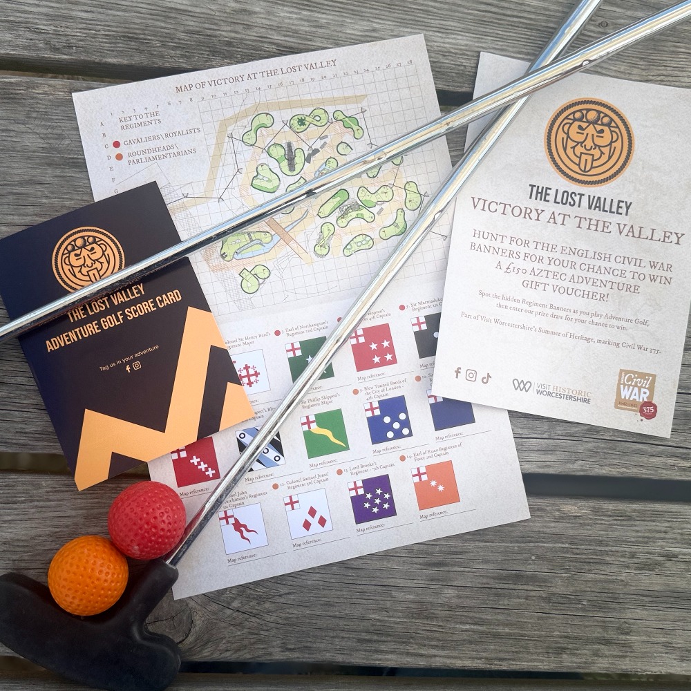 Victory at The Lost Valley score card, course map showing Cavaliers and Roundheads holes, Regiment Banner flag guide, golf clubs and coloured golf balls