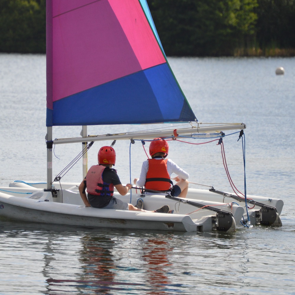 Sailing boats on the lake at Aztec Adventure Upton Warren