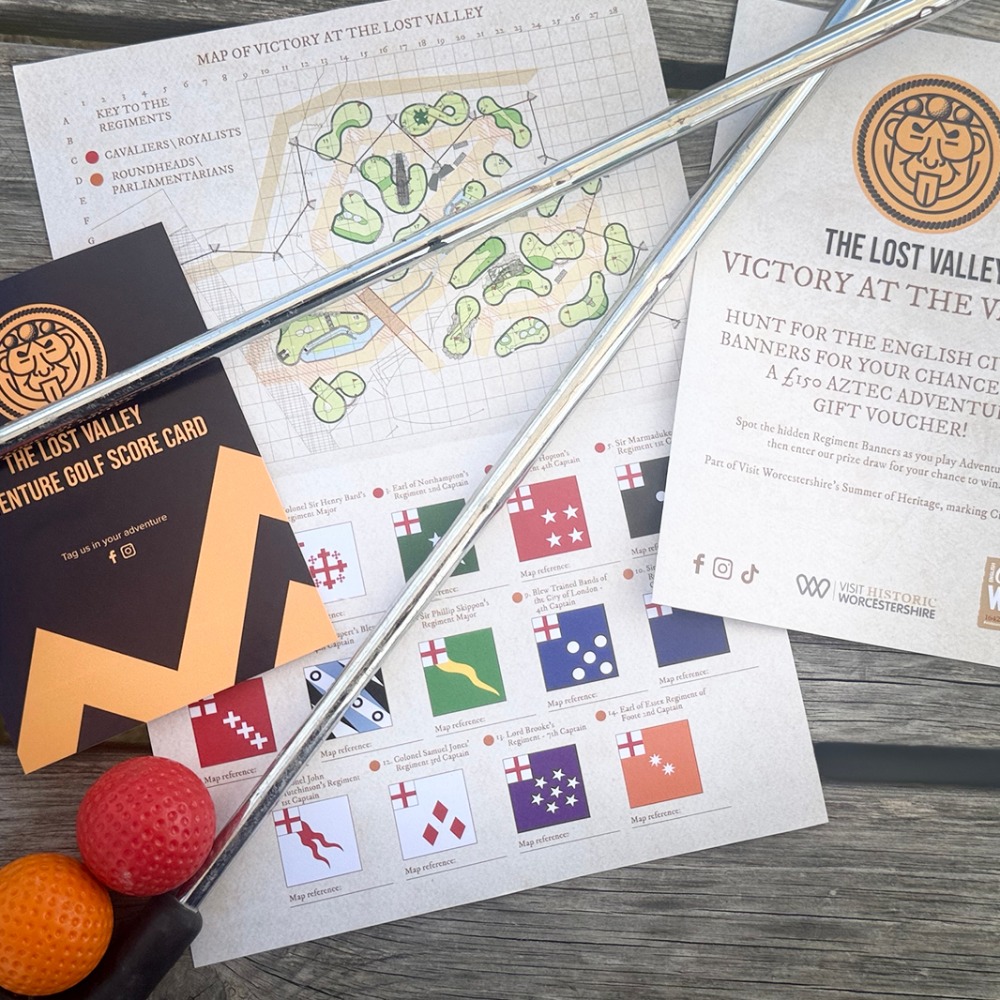 Victory at The Lost Valley score card, course map showing Cavaliers and Roundheads holes, Regiment Banner flag guide, golf clubs and coloured golf balls